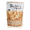 A 10oz bag of Fisher’s Popcorn Cheddar Dusted Caramel Popcorn, in white and brown packaging with popcorn images, labeled gluten free, handmade, and made with simple ingredients.