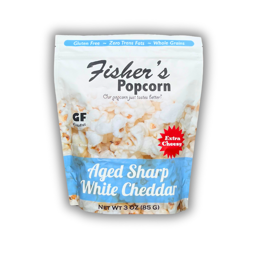 Fisher's Popcorn 3oz Bag White Cheddar Popcorn is gluten-free, extra cheesy, and highlights whole grains, zero trans fats, and bold Aged Sharp White Cheddar flavor. The packaging features popcorn images.