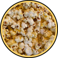 A close-up of fluffy white popcorn topped with a light drizzle of Fisher's Popcorn Butter Flavored, all framed by a circular yellow and black border.