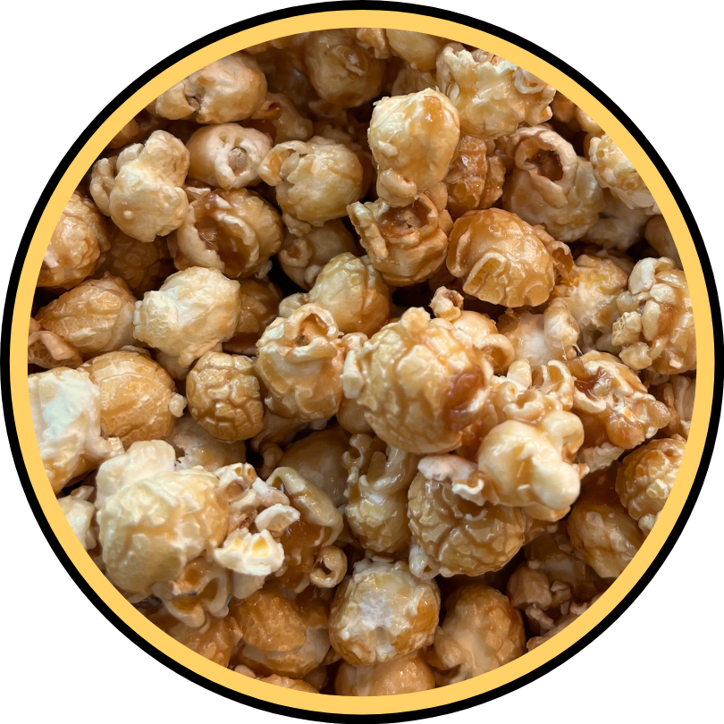 A close-up of glossy, golden brown caramel popcorn from Fisher's Popcorn's Sm Xmas Caramel, shown inside a circular yellow and black frame—ideal for a festive holiday bundle or a small caramel tub.
