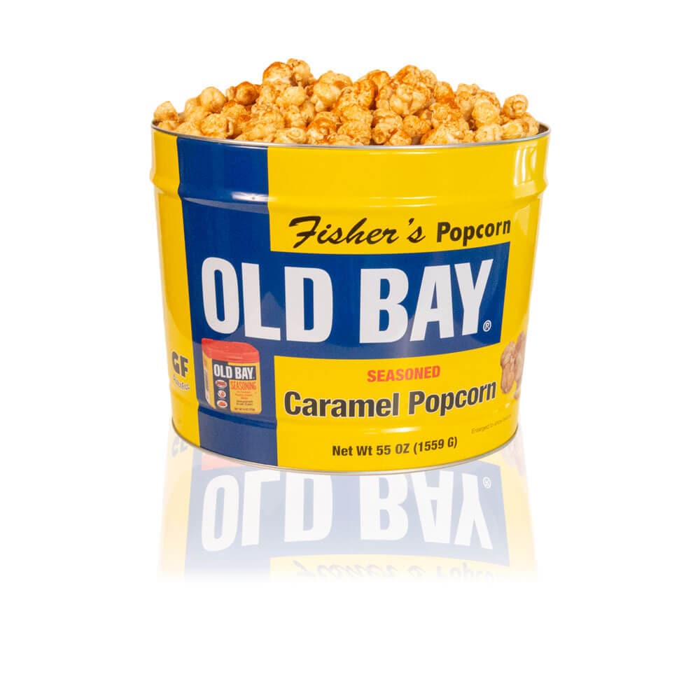 The 2 Gallon OLD BAY® Tin by Fisher's Popcorn features OLD BAY caramel popcorn in a blue and yellow limited edition tin with the iconic logo and images of delicious caramel popcorn.